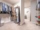 Walk-in closet with ample storage space and neatly organized clothing racks at 3227 Cape Fox Ct, Denver, NC 28037