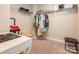 Spacious walk-in closet with shelving and clothing racks for organized storage at 3227 Cape Fox Ct, Denver, NC 28037