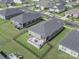 An aerial view of a home with a fenced backyard and a patio with outdoor furniture at 3317 Black Cherry Dr, Monroe, NC 28110