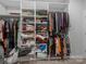 Organized walk-in closet featuring ample hanging and shelving space for clothes and accessories at 3317 Black Cherry Dr, Monroe, NC 28110