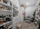 Well-organized walk-in closet with custom shelving, drawers, and ample storage space at 3317 Black Cherry Dr, Monroe, NC 28110