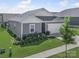 Single-story home with a two-car garage, well-maintained lawn and landscaping at 3317 Black Cherry Dr, Monroe, NC 28110