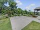 Community grilling area with two grills and ample space for outdoor gatherings at 3317 Black Cherry Dr, Monroe, NC 28110