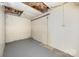 Unfinished basement with concrete floor at 38367 Loblolly Ln, New London, NC 28127
