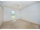 Bedroom with natural light and spacious closet at 38367 Loblolly Ln, New London, NC 28127