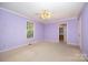 Cozy bedroom with carpet flooring and a window at 38367 Loblolly Ln, New London, NC 28127