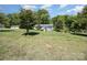 Charming single-story home featuring a well-manicured lawn and traditional front porch at 38367 Loblolly Ln, New London, NC 28127