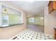 View of the kitchen with a breakfast bar overlooking the living room at 38367 Loblolly Ln, New London, NC 28127