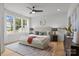 Bright bedroom features a comfortable bed, large windows, and tasteful decor at 3937 Plainview Rd, Charlotte, NC 28208