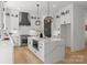 Spacious kitchen with stainless appliances and quartz island at 3937 Plainview Rd, Charlotte, NC 28208