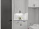 Bright kitchen features white cabinets, stylish backsplash, and modern design elements at 3937 Plainview Rd, Charlotte, NC 28208