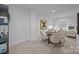 Finished basement area with game table and comfortable seating at 3945 Plainview Rd, Charlotte, NC 28208