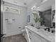 Modern bathroom with double vanity and tiled shower at 3945 Plainview Rd, Charlotte, NC 28208
