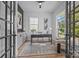 Bright office space with large windows, stylish desk, and elegant decor for a productive work environment at 3945 Plainview Rd, Charlotte, NC 28208