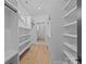 Spacious walk-in closet with shelving and ample storage space at 3945 Plainview Rd, Charlotte, NC 28208