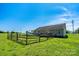 Spacious backyard with a charming fence and a well-maintained lawn, offering a serene outdoor space at 402 Beaver Dam Church Rd, Shelby, NC 28152