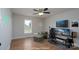 Virtually staged bedroom with hardwood floors, gaming setup, and neutral colors, creating a modern and versatile space at 402 Beaver Dam Church Rd, Shelby, NC 28152