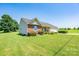 Charming single-story home featuring vinyl siding and a well-manicured lawn at 402 Beaver Dam Church Rd, Shelby, NC 28152