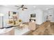 Bright and airy living room featuring modern furniture, hardwood floors, and a stylish decor at 4474 Pebblebrook Sw Cir, Concord, NC 28027