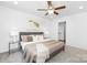 The main bedroom features a ceiling fan, with a connected on-suite at 4474 Pebblebrook Sw Cir, Concord, NC 28027