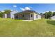 Backyard with green lawn, showcasing the home's exterior siding at 455 Contentment Ct # 18, Kannapolis, NC 28081