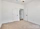 Bedroom with neutral walls and carpet plus walk-in closet access at 455 Contentment Ct # 18, Kannapolis, NC 28081