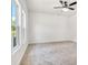 Carpeted bedroom featuring a ceiling fan and large windows at 455 Contentment Ct # 18, Kannapolis, NC 28081