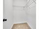 Walk-in closet with shelving for storage and carpet flooring at 455 Contentment Ct # 18, Kannapolis, NC 28081