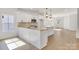 Well-lit kitchen featuring an island with granite countertops and stainless steel appliances at 455 Contentment Ct # 18, Kannapolis, NC 28081