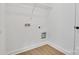 A utility space featuring laminate flooring and washing machine connections at 455 Contentment Ct # 18, Kannapolis, NC 28081