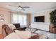 Well-lit living room featuring modern furnishings, neutral colors, and a cozy atmosphere at 5909 Cougar Ln, Charlotte, NC 28269
