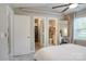 Comfortable bedroom with doors to closet and bath, plus good natural light at 5909 Cougar Ln, Charlotte, NC 28269