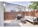 Outdoor patio area perfect for grilling and relaxing on comfortable seating at 5909 Cougar Ln, Charlotte, NC 28269