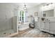 Elegant bathroom showcasing a freestanding tub, glass shower, and wooden decor at 602 Unity St, Fort Mill, SC 29715
