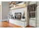 Close-up of a modern fireplace with white stone and decorative mantle in the living room at 602 Unity St, Fort Mill, SC 29715