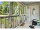 Cozy screened porch with a white door and outdoor seating at 602 Unity St, Fort Mill, SC 29715