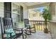 Inviting screened front porch with rocking chairs, offering a relaxing outdoor space at 602 Unity St, Fort Mill, SC 29715