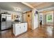 Spacious kitchen features an island, stainless steel appliances, and a sliding barn door at 602 Unity St, Fort Mill, SC 29715