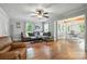 Spacious living room with hardwood floors, a comfortable seating area, and lots of natural light at 602 Unity St, Fort Mill, SC 29715