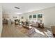 Sunlit living room with a comfortable sofa, stylish decor, and a view to the outdoors at 626 Wabash Ave # 6, Charlotte, NC 28208