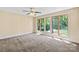 Comfortable bedroom with carpet, large windows, and picturesque lake views at 698 Normandy Rd, Mooresville, NC 28117