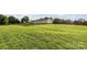Lush backyard view showcasing the expansive lawn, perfect for outdoor enjoyment at 746 Joe Lentz Rd, Salisbury, NC 28146