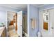 A bright bathroom with a walk-in shower and vanity, leads to the bedroom at 746 Joe Lentz Rd, Salisbury, NC 28146