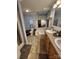 Primary bathroom with double vanity, soaking tub, and decorative accents at 746 Joe Lentz Rd, Salisbury, NC 28146