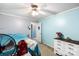 Bedroom featuring carpet flooring, a ceiling fan, light blue walls, and a white dresser at 746 Joe Lentz Rd, Salisbury, NC 28146