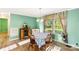 Bright dining area with a table, four chairs, a window and hardwood floors at 746 Joe Lentz Rd, Salisbury, NC 28146