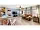Inviting living room featuring hardwood floors, a ceiling fan, and ample natural light at 746 Joe Lentz Rd, Salisbury, NC 28146