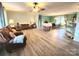 Inviting living room with wood flooring, a ceiling fan, and coordinated furnishings at 746 Joe Lentz Rd, Salisbury, NC 28146