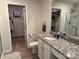 Bright bathroom with granite countertop, wood-look flooring and a glass door shower at 811 Constantine Rd, Richburg, SC 29729