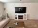 Comfortable living room with a fireplace, television, sofa, and a coffee table at 811 Constantine Rd, Richburg, SC 29729